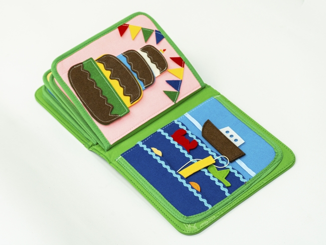 Развивающая игрушка для малышей «Первая книга» Развивающая игрушка для малышей «Первая книга»