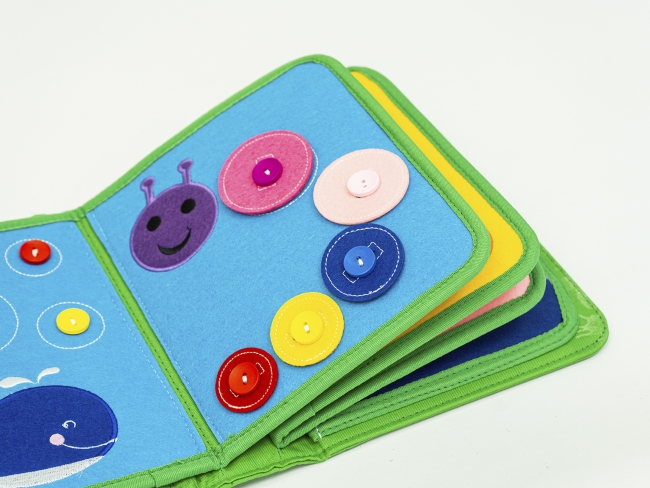 Развивающая игрушка для малышей «Первая книга» Развивающая игрушка для малышей «Первая книга»